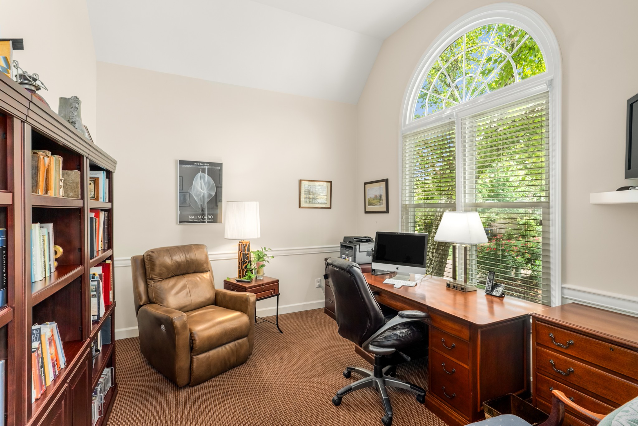 446 Savannah Way Franklin, TN 37067 - Photo 4 of 30 a view of a livingroom with workspace and a window