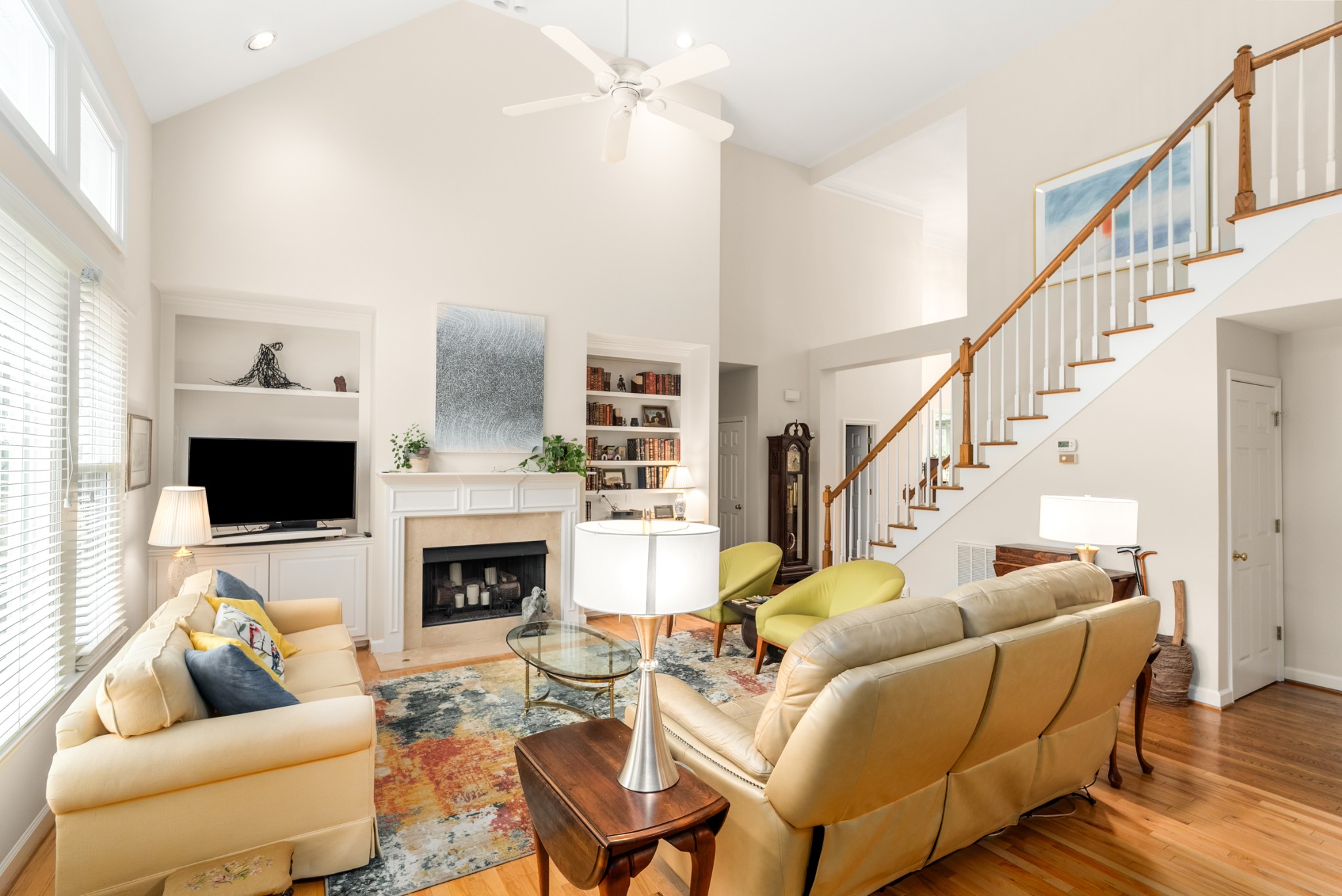 446 Savannah Way Franklin, TN 37067 - Photo 7 of 30 a living room with furniture fireplace and a flat screen tv