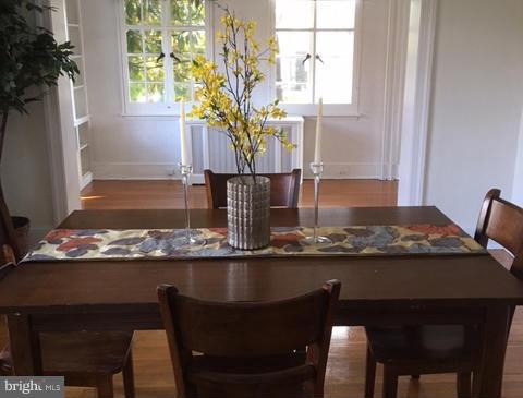 4419 Underwood Road Baltimore, MD 21218 - Photo 9 of 30 a view of a dining room with furniture and window