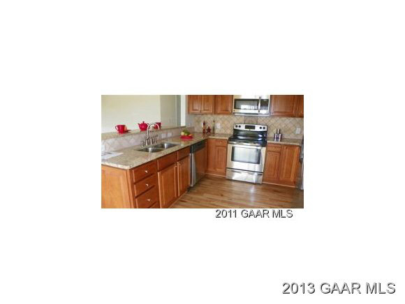 18 Fox Crest Ridge Staunton, VA 24401 - Photo 3 of 4 a kitchen with stainless steel appliances a stove and a refrigerator