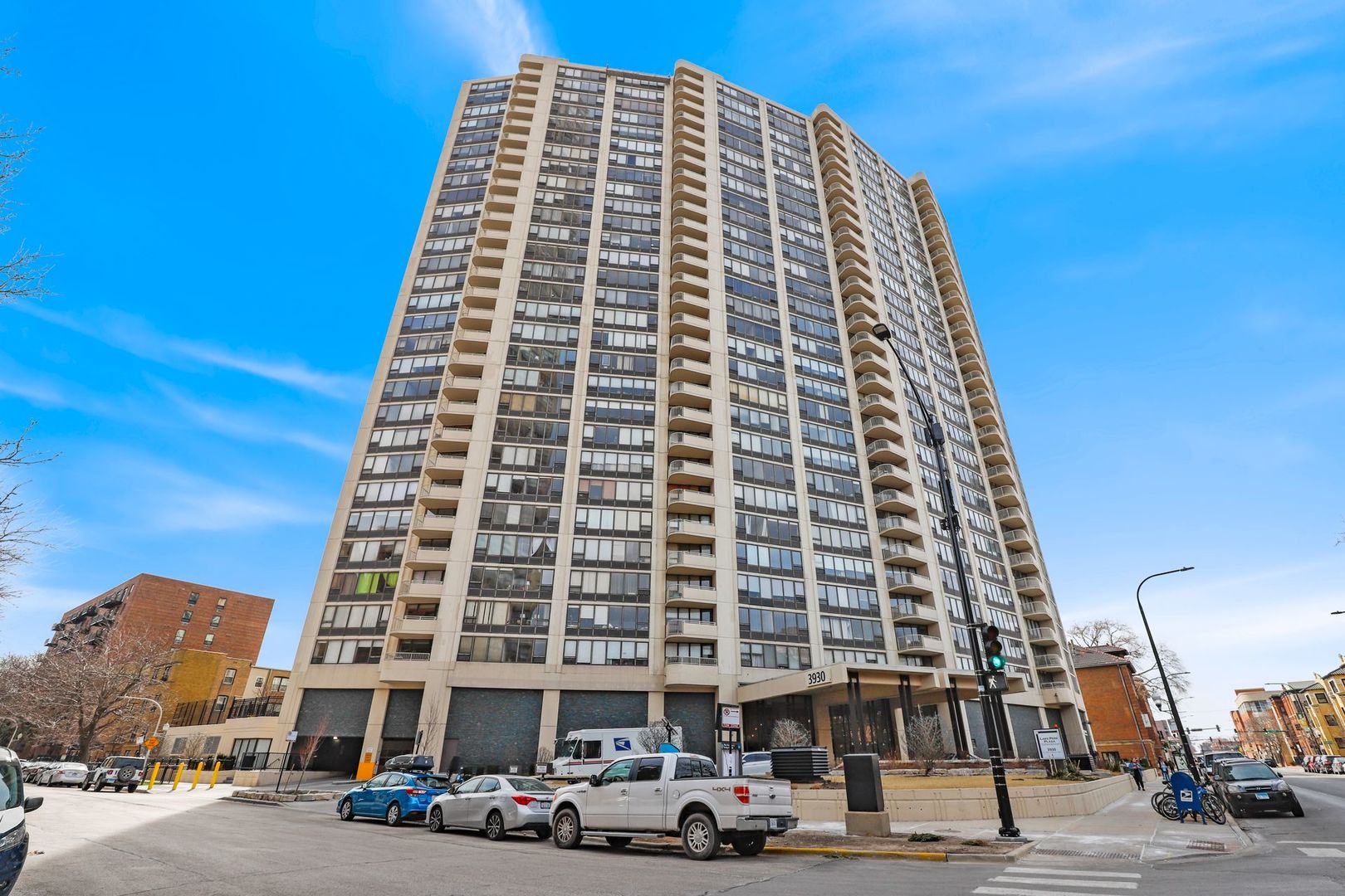 3930 North Pine Grove Avenue, Unit 406 Chicago, IL 60613 - Photo 1 of 21 a front view of a building