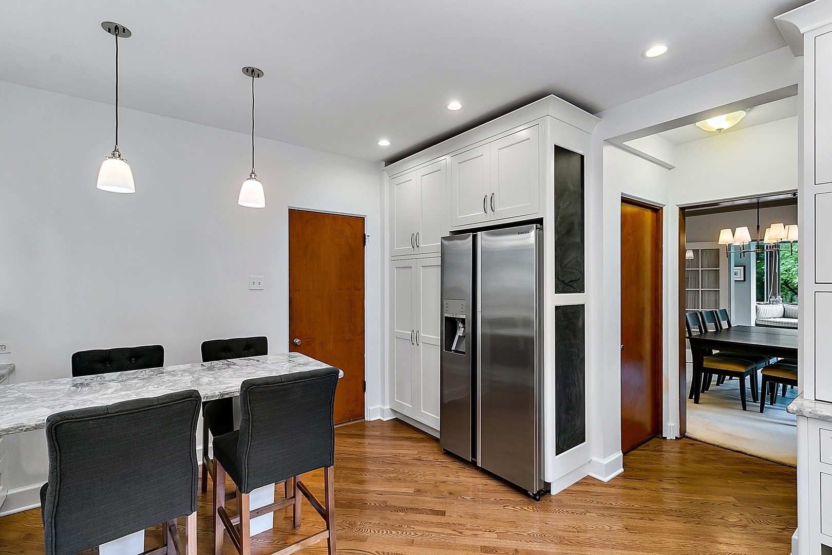424 Uvedale Road Riverside, IL 60546 - Photo 14 of 46 a kitchen with stainless steel appliances granite countertop a refrigerator a sink and a stove