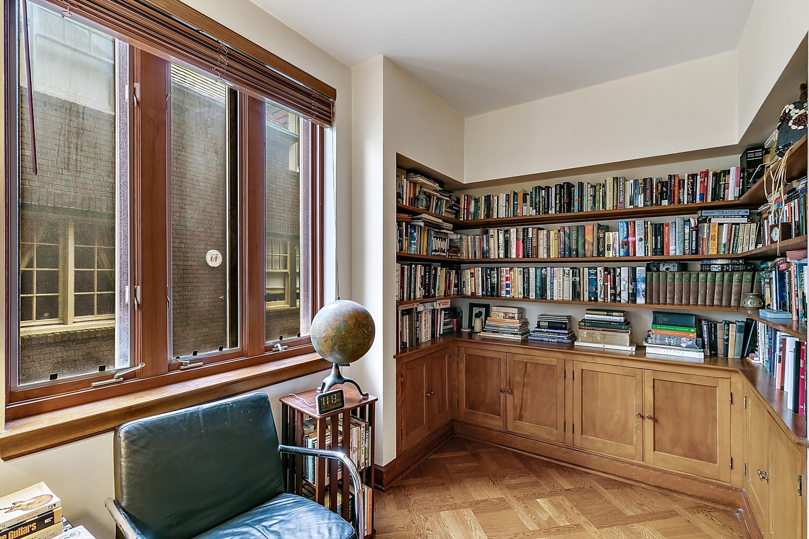 424 Uvedale Road Riverside, IL 60546 - Photo 16 of 46 a reading room with furniture and book shelf