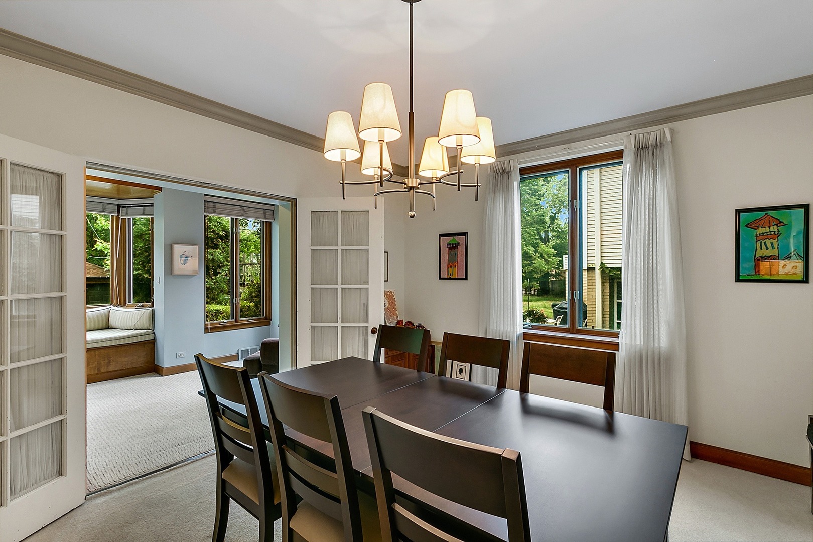 424 Uvedale Road Riverside, IL 60546 - Photo 6 of 46 a view of a dining room with furniture window and outside view