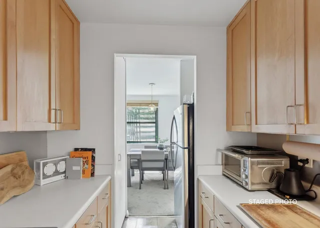 a view of a livingroom with furniture and window