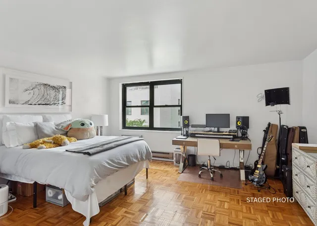 a kitchen with stainless steel appliances a refrigerator and a stove top oven