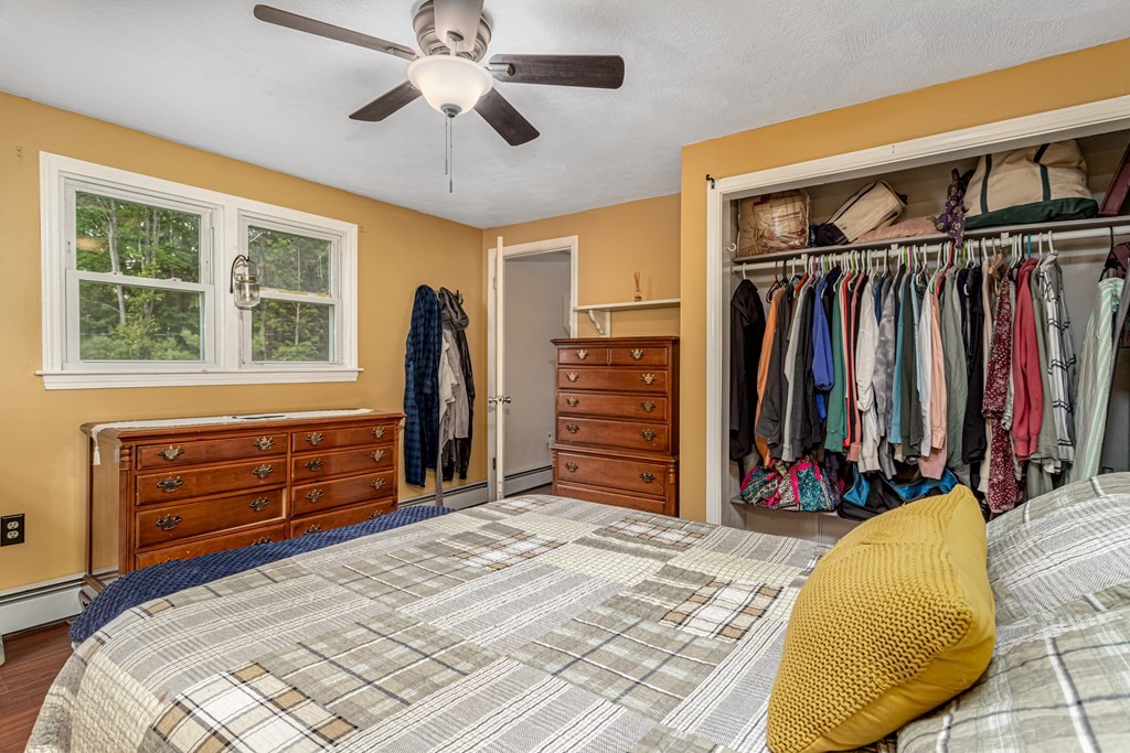 70 Valley Road Lunenburg, MA 01462 - Photo 15 of 42 a bed room with a bed and a closet