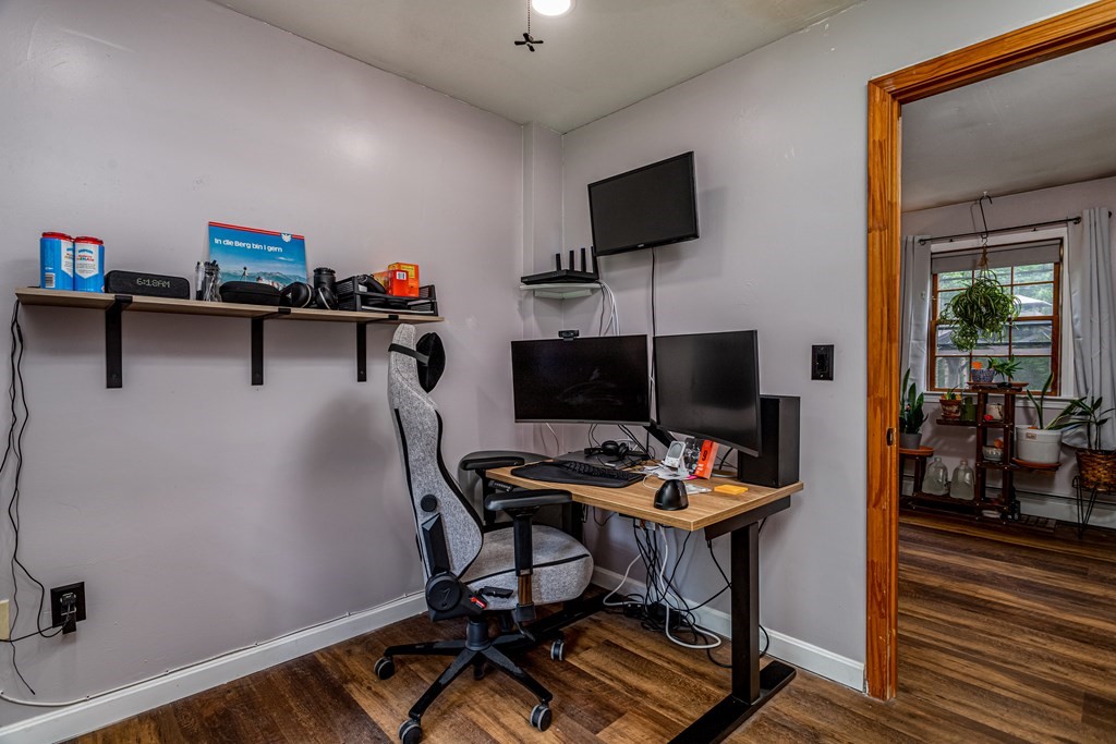70 Valley Road Lunenburg, MA 01462 - Photo 20 of 42 a work room with furniture and a flat screen tv