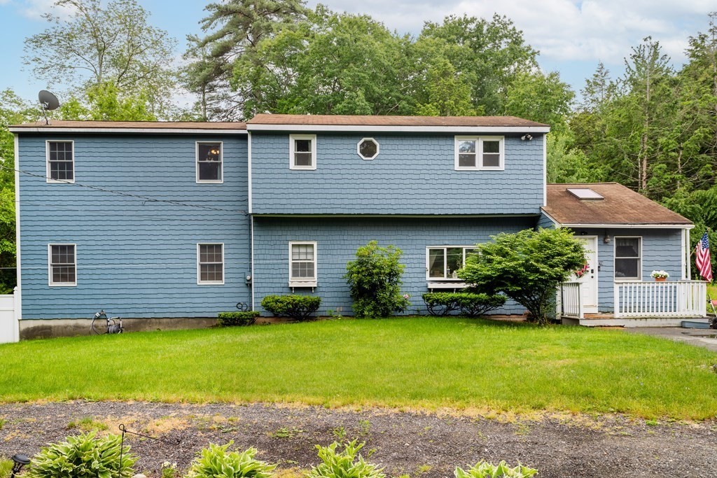 70 Valley Road Lunenburg, MA 01462 - Photo 2 of 42 a front view of a house with a yard
