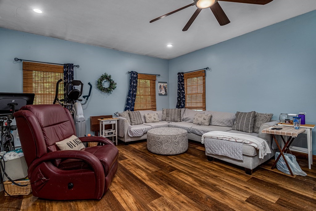 70 Valley Road Lunenburg, MA 01462 - Photo 25 of 42 a living room with furniture and a ceiling fan