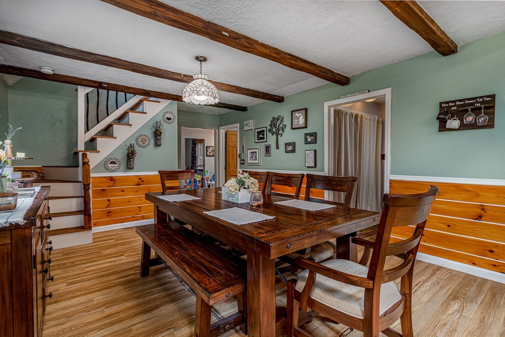 70 Valley Road Lunenburg, MA 01462 - Photo 29 of 42 a view of a dining room with furniture and wooden floor