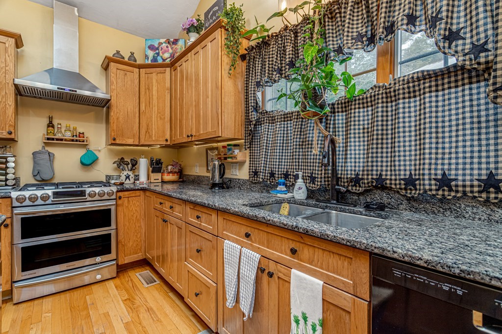 70 Valley Road Lunenburg, MA 01462 - Photo 36 of 42 a kitchen with sink and cabinets