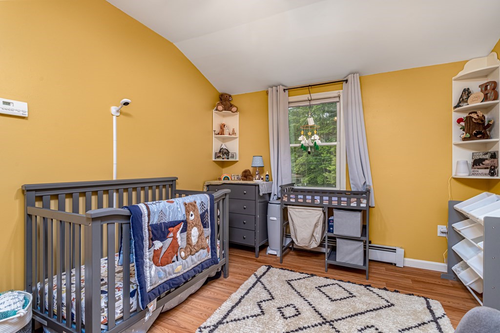 70 Valley Road Lunenburg, MA 01462 - Photo 4 of 42 a view of a bedroom with furniture and windows