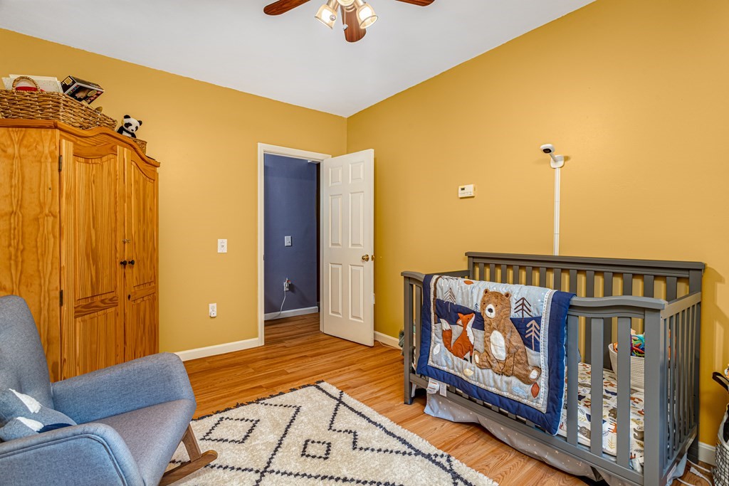 70 Valley Road Lunenburg, MA 01462 - Photo 5 of 42 a view of a hallway with wooden floor and staircase