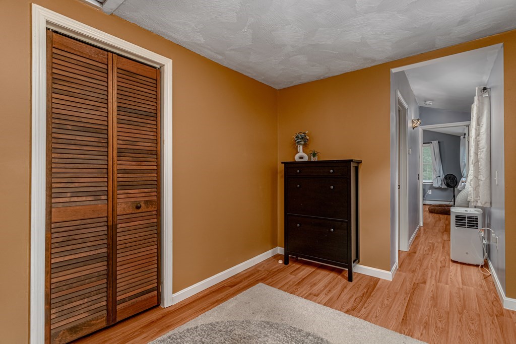 70 Valley Road Lunenburg, MA 01462 - Photo 6 of 42 a view of a room with wooden floor