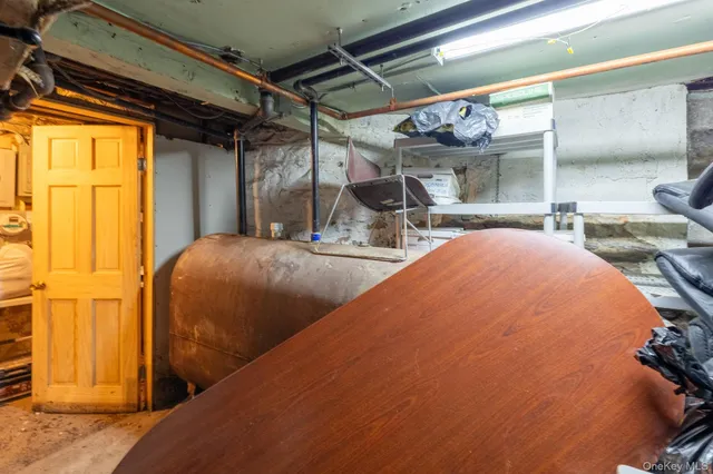 a bedroom with bed and window