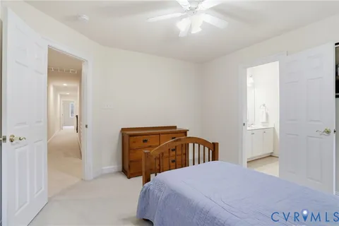 a bathroom with a shower and a sink