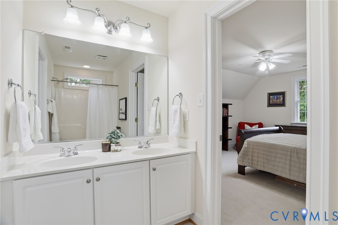 14331 Roderick Court Midlothian, VA 23113 - Photo 28 of 71 a en suite bathroom with 2 sink tub and a mirror