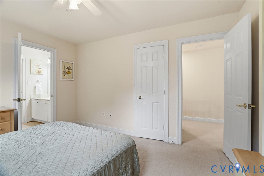14331 Roderick Court Midlothian, VA 23113 - Photo 34 of 71 a bedroom with a bed and a hallway