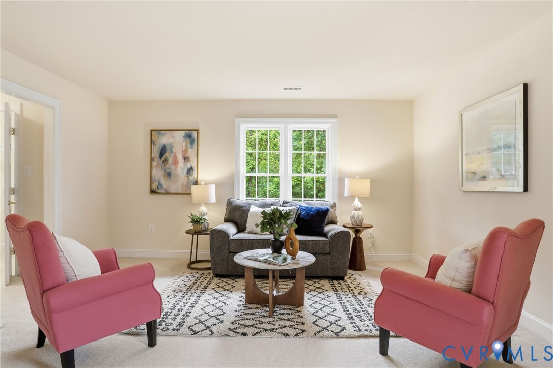 14331 Roderick Court Midlothian, VA 23113 - Photo 39 of 71 a living room with furniture and a large window