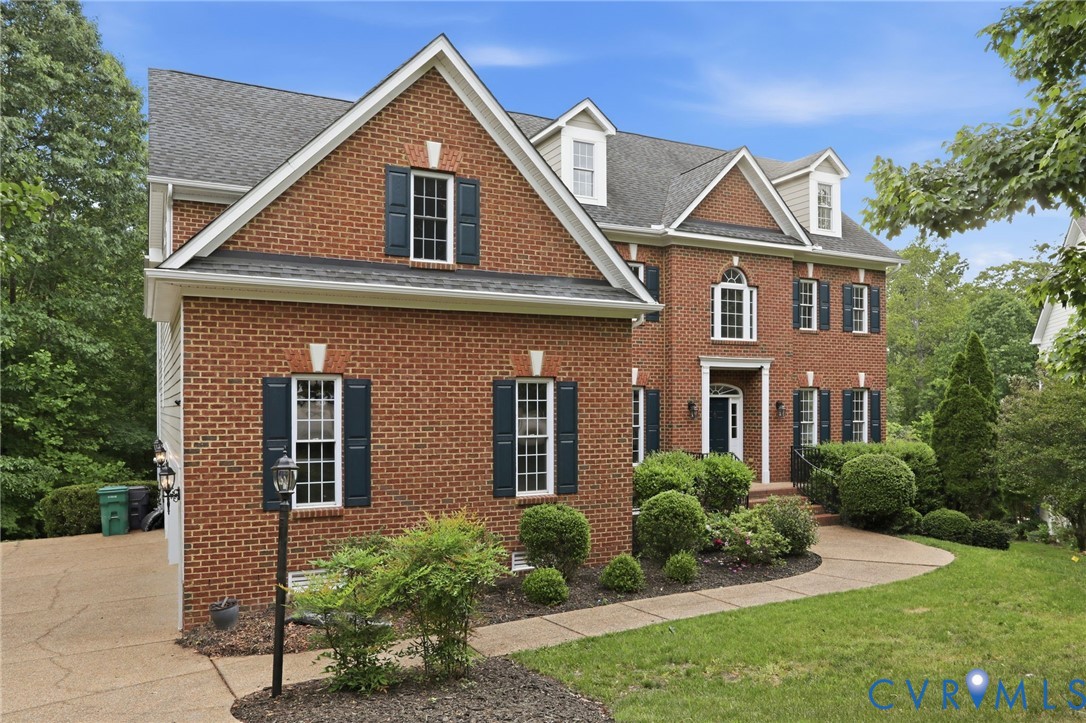 14331 Roderick Court Midlothian, VA 23113 - Photo 4 of 71 a front view of a house with a yard