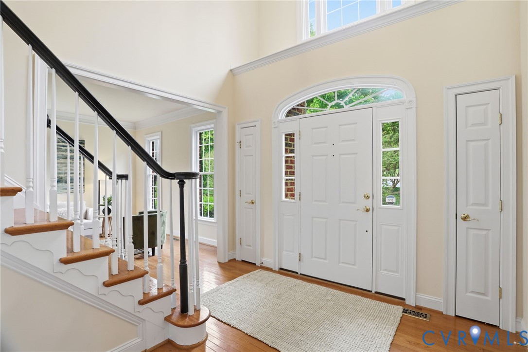 14331 Roderick Court Midlothian, VA 23113 - Photo 7 of 71 a view of an entryway with wooden floor and door
