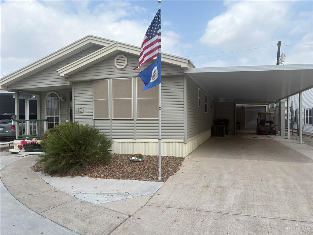 197 Laurel Road Pharr, TX 78577 - Photo 2 of 38 a view of a house with a small yard and plants