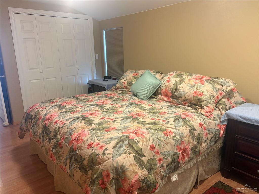 197 Laurel Road Pharr, TX 78577 - Photo 22 of 38 a bedroom with a bed and a window