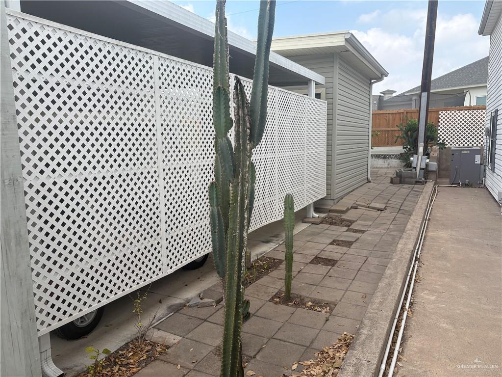 197 Laurel Road Pharr, TX 78577 - Photo 8 of 38 a view of a pathway gate of a building