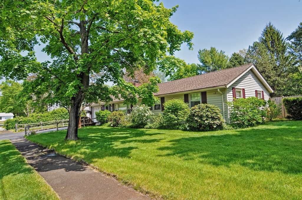 13 Sunnyvale Street Beverly, MA 01915 - Photo 1 of 25 a front view of a house with a yard