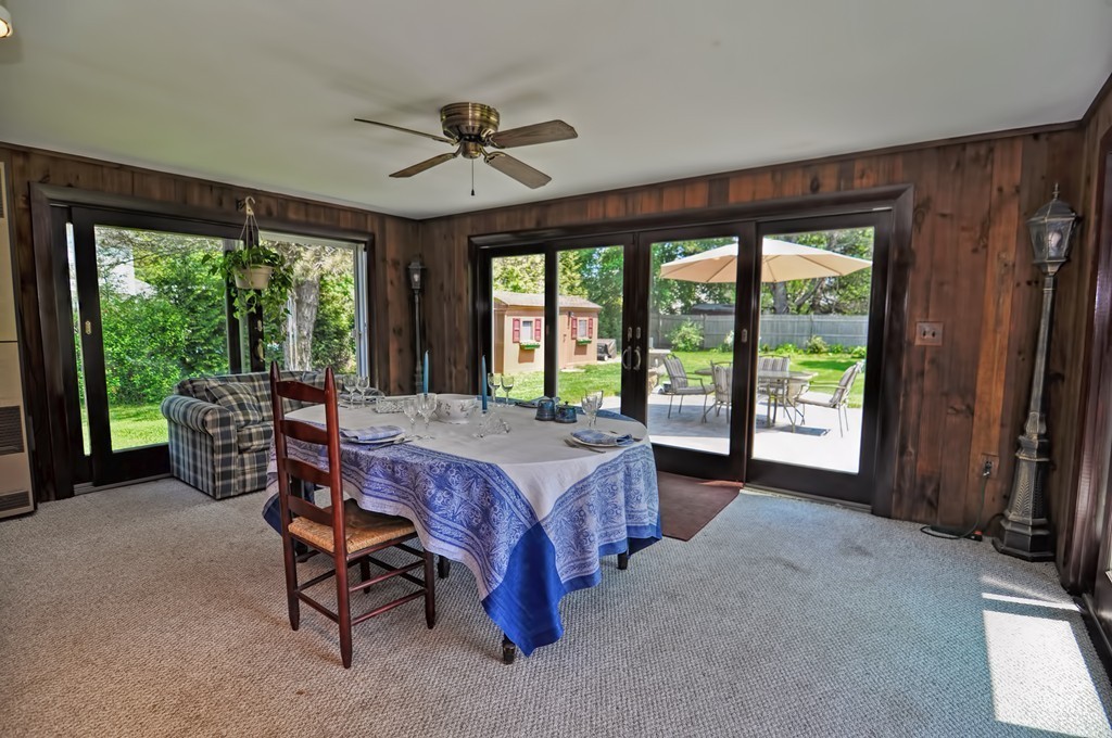 13 Sunnyvale Street Beverly, MA 01915 - Photo 12 of 25 a bed sitting in a room next to a window
