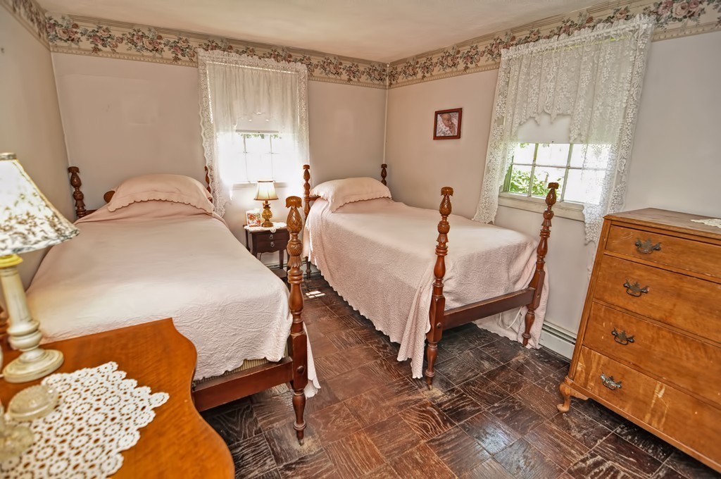 13 Sunnyvale Street Beverly, MA 01915 - Photo 21 of 25 a bedroom with a bed and a window