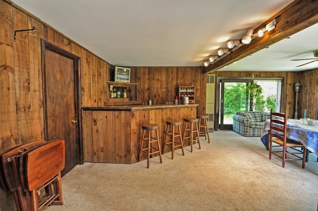 13 Sunnyvale Street Beverly, MA 01915 - Photo 10 of 25 a very nice looking room with many windows and furniture
