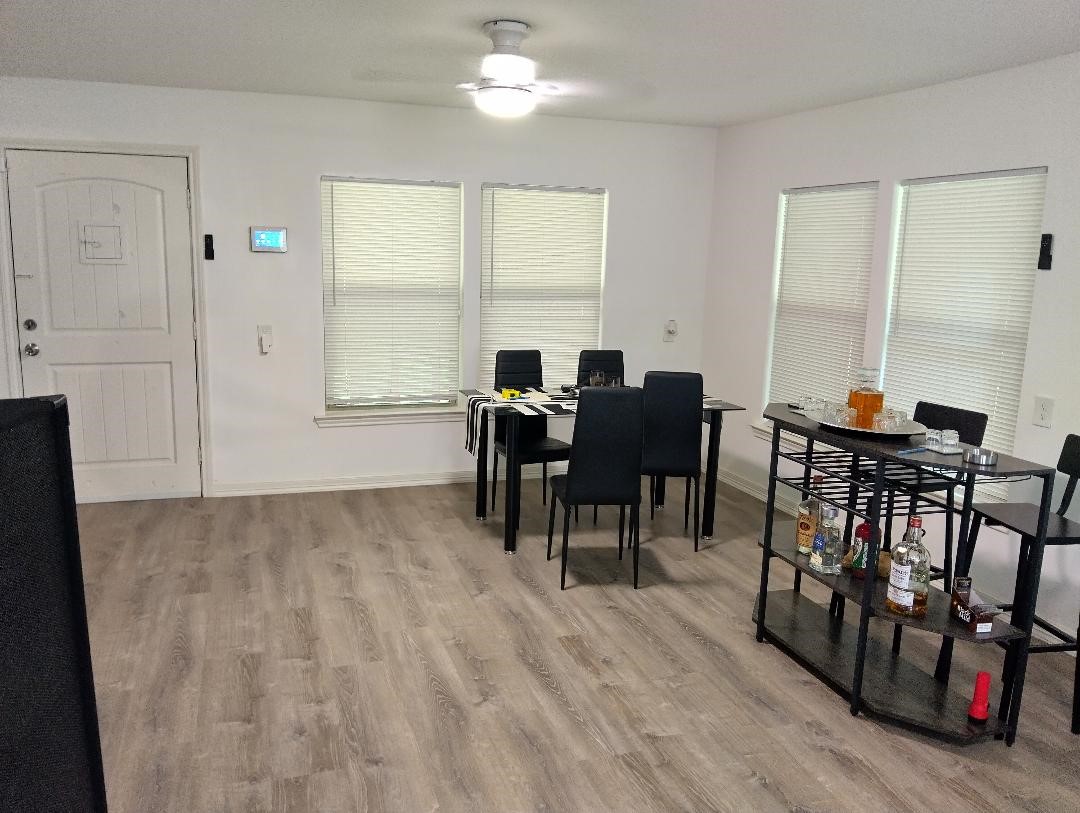 260 County Road 360 Splendora, TX 77372 - Photo 3 of 15 a view of a dining room with furniture window and outside view