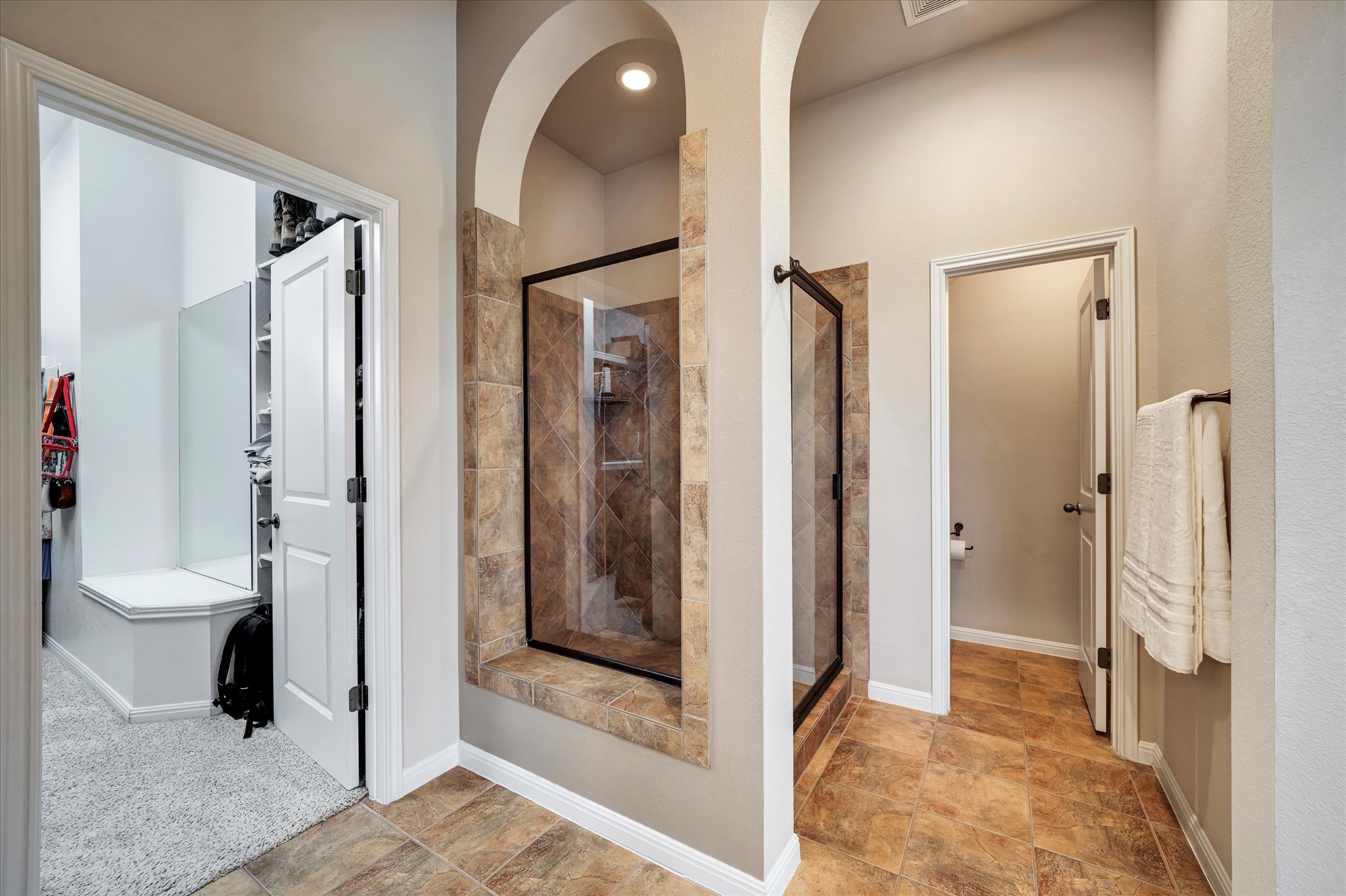440 Currie Ranch Road Wimberley, TX 78676 - Photo 18 of 40 a bathroom with a glass door shower and a sink