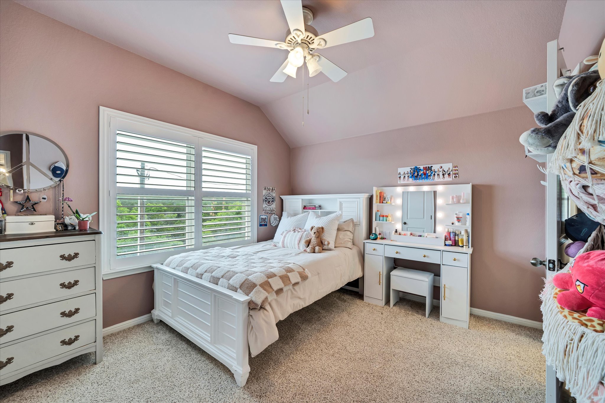 440 Currie Ranch Road Wimberley, TX 78676 - Photo 27 of 40 a bed room with a bed and a window