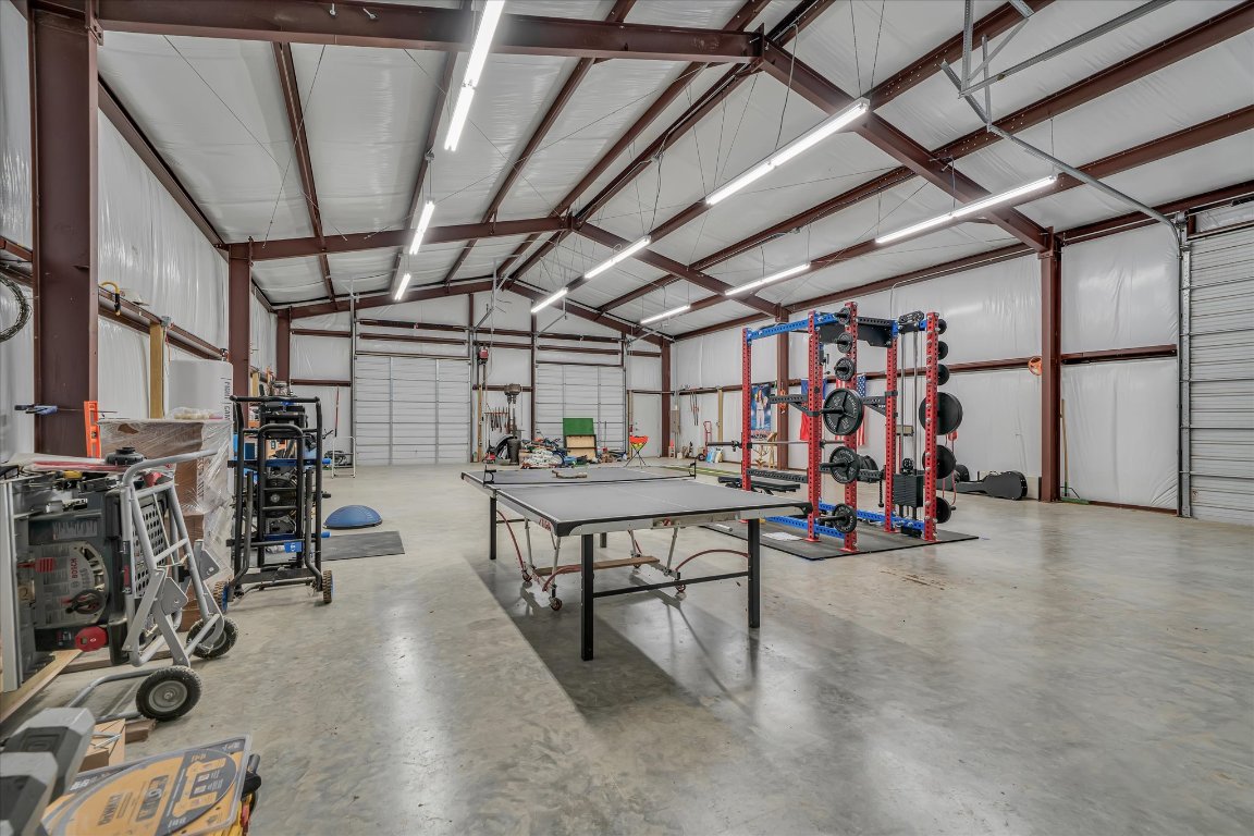 440 Currie Ranch Road Wimberley, TX 78676 - Photo 35 of 40 a view of a room with gym equipment