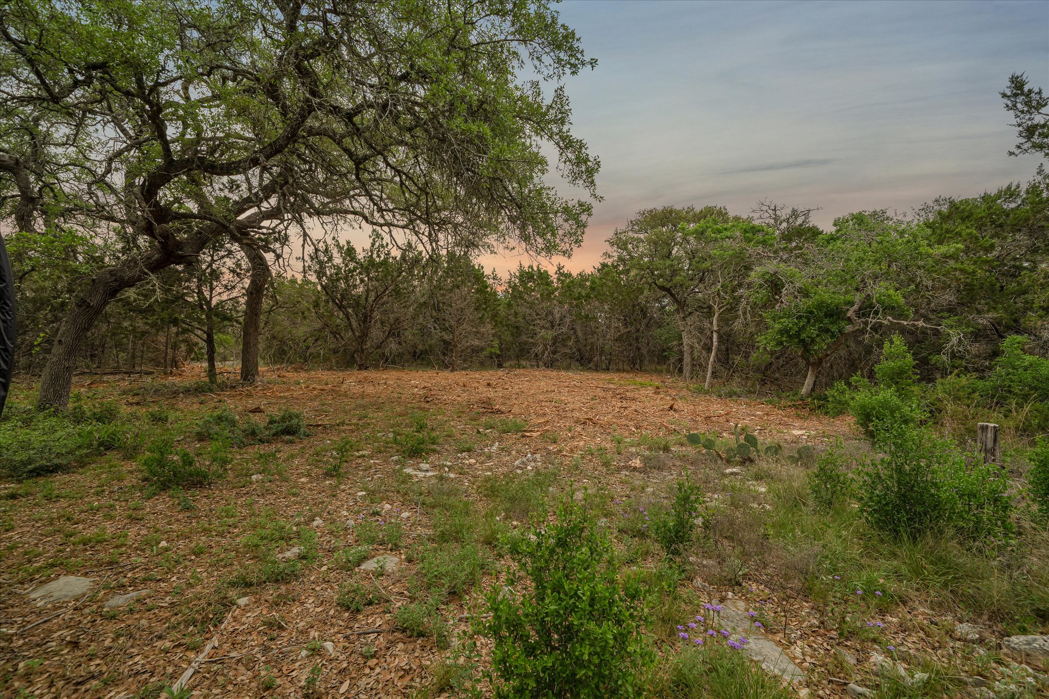 440 Currie Ranch Road Wimberley, TX 78676 - Photo 36 of 40 a view of outdoor space with deck and yard