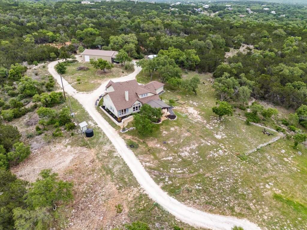 440 Currie Ranch Road Wimberley, TX 78676 - Photo 39 of 40 an aerial view of residential houses with outdoor space
