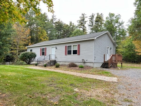 34 Sherbert Road Ashburnham, MA 01430 - Photo 2 of 20 a backyard of a house with seating space