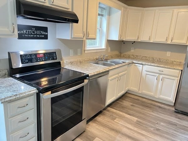 34 Sherbert Road Ashburnham, MA 01430 - Photo 3 of 20 a kitchen with granite countertop a stove sink and cabinets