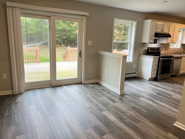 34 Sherbert Road Ashburnham, MA 01430 - Photo 6 of 20 a view of a kitchen with wooden floor and electronic appliances