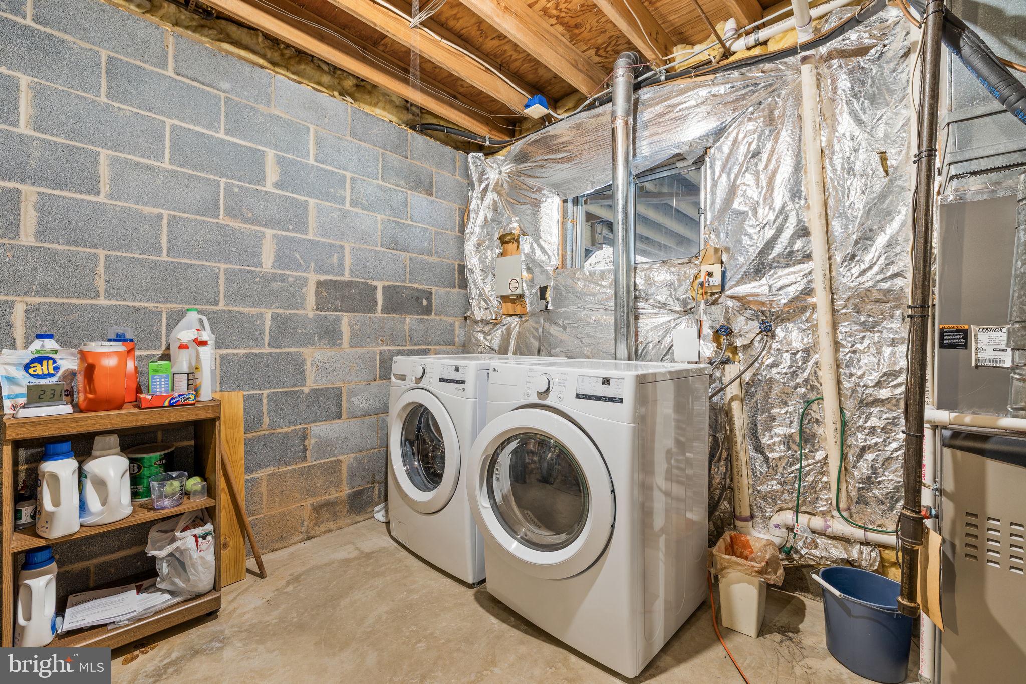 13911 Ruler Court Woodbridge, VA 22193 - Photo 27 of 38 a utility room with dryer and washer
