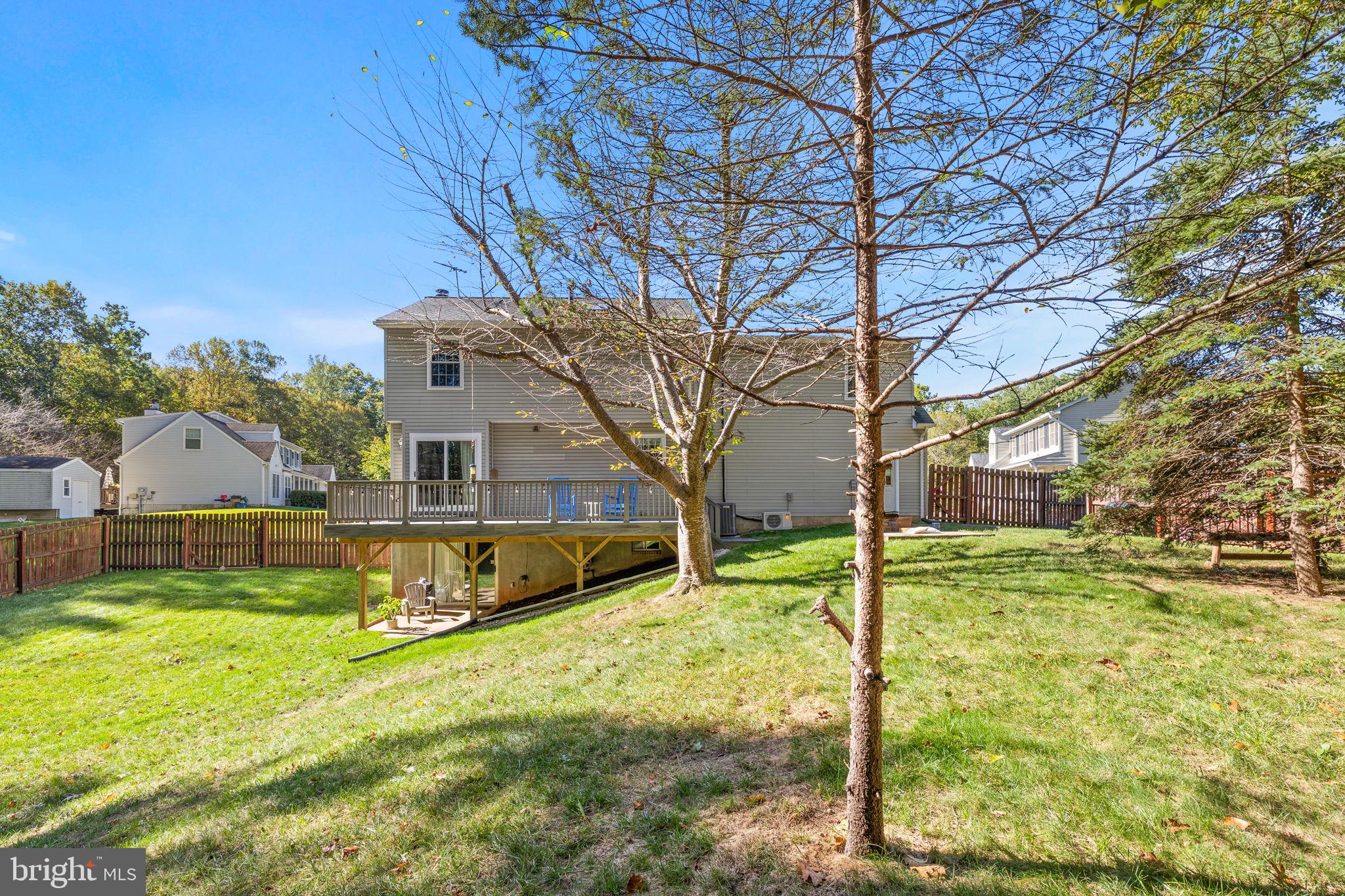 13911 Ruler Court Woodbridge, VA 22193 - Photo 28 of 38 a view of a house with a yard