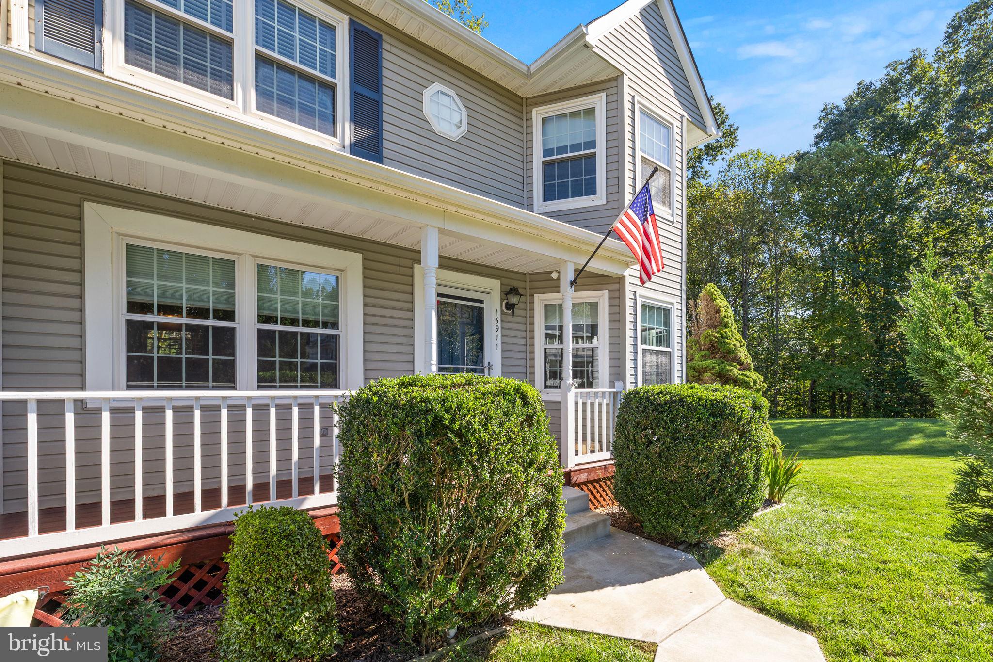 13911 Ruler Court Woodbridge, VA 22193 - Photo 4 of 38 a house view with a garden space
