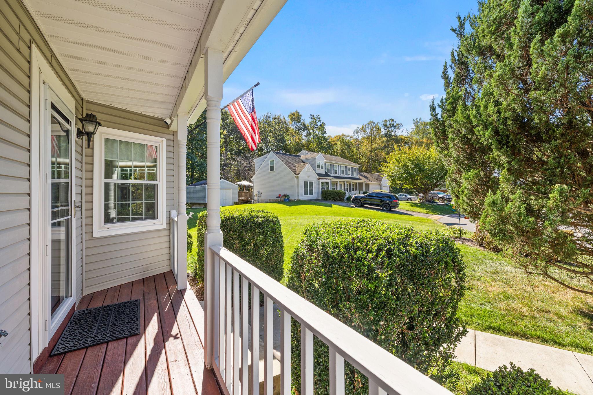 13911 Ruler Court Woodbridge, VA 22193 - Photo 5 of 38 a view of a house with a yard