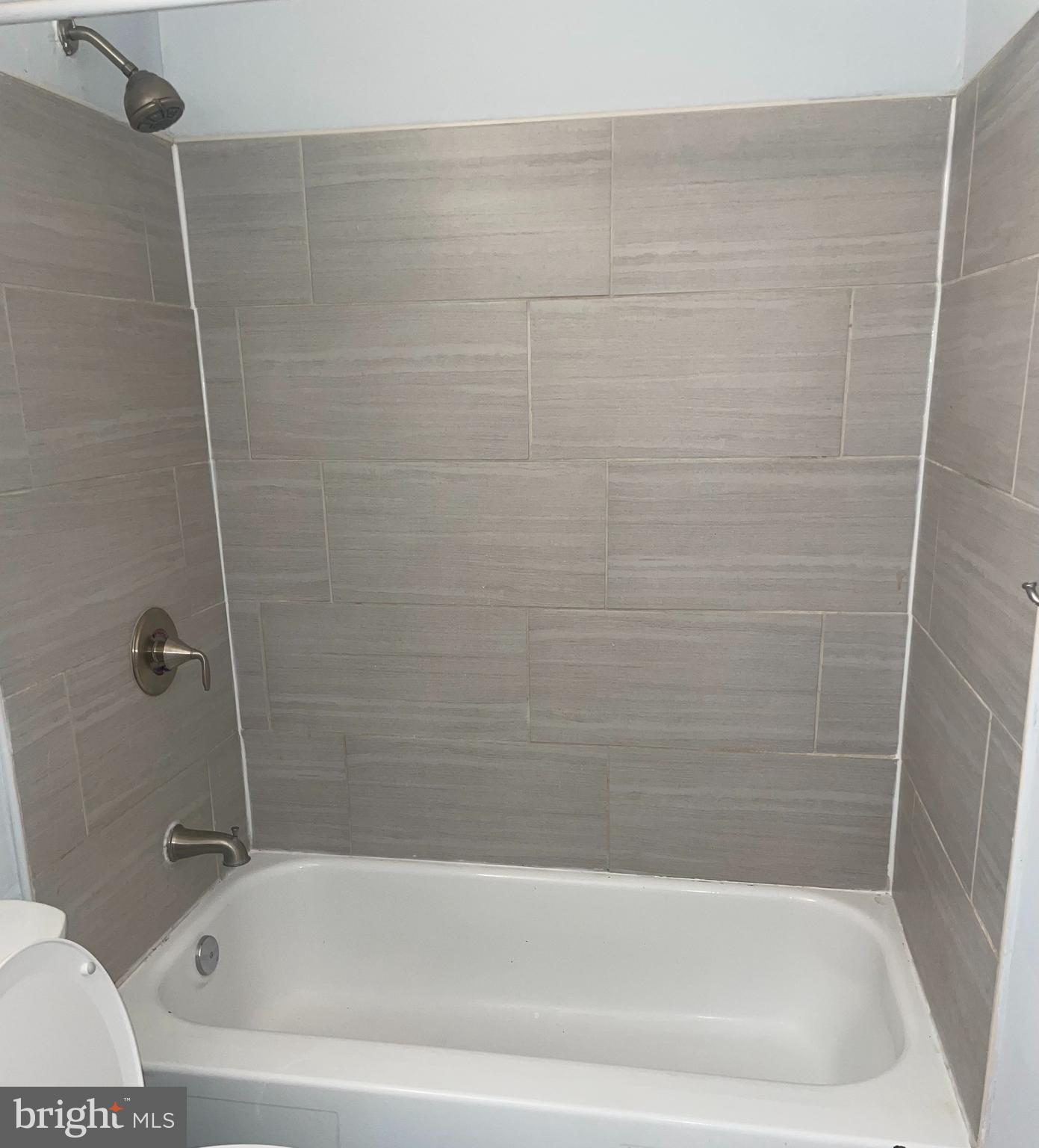 1294 Cooper Street, Unit A10 Edgewater Park, NJ 08010 - Photo 18 of 22 a bathroom with a bathtub