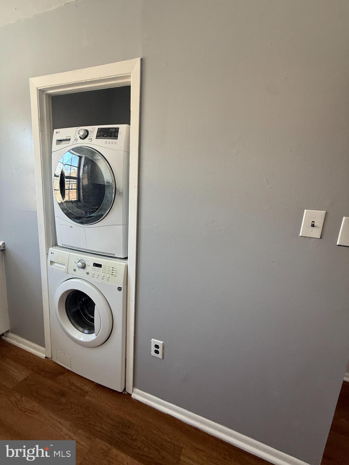 1294 Cooper Street, Unit A10 Edgewater Park, NJ 08010 - Photo 7 of 22 a close up view of a washer and dryer in a small white room