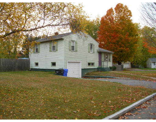 11 Navajo Road Springfield, MA 01109 - Photo 1 of 1 a view of a yard with a house and a large tree