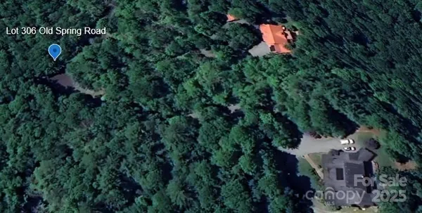 a view of a park with houses